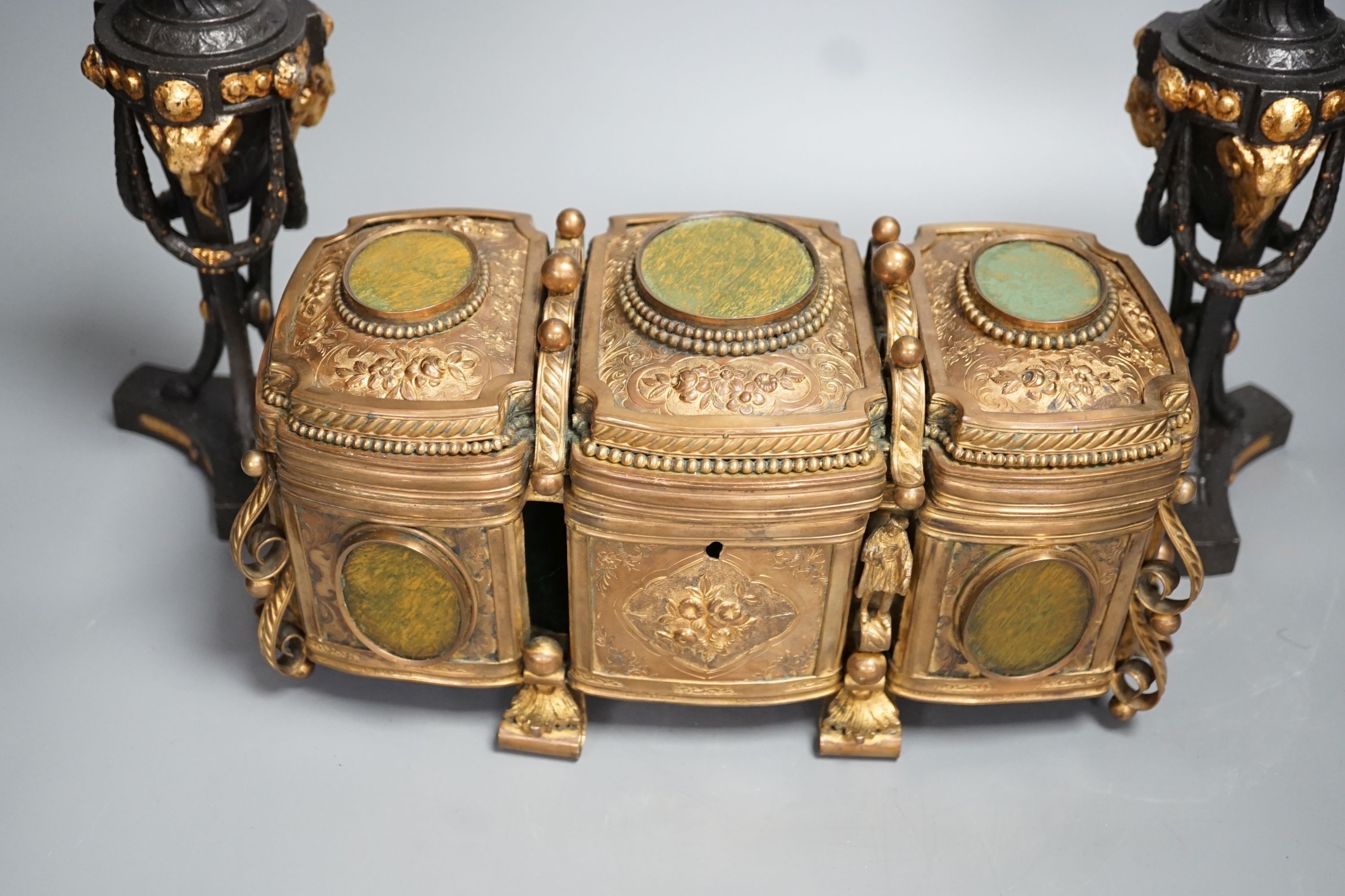 A French gilt metal casket inset with reverse painted glass panels and a pair of ormolu style candlesticks, 22.5cm tall